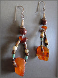 Antique Carnelian, Amber, and Old Bead Dangle Earrings