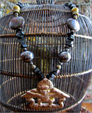 Tibetan Khyung Garuda Pendant on Rich Gemstone Strand